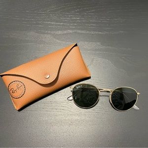Round metal Ray-Ban sunglasses.